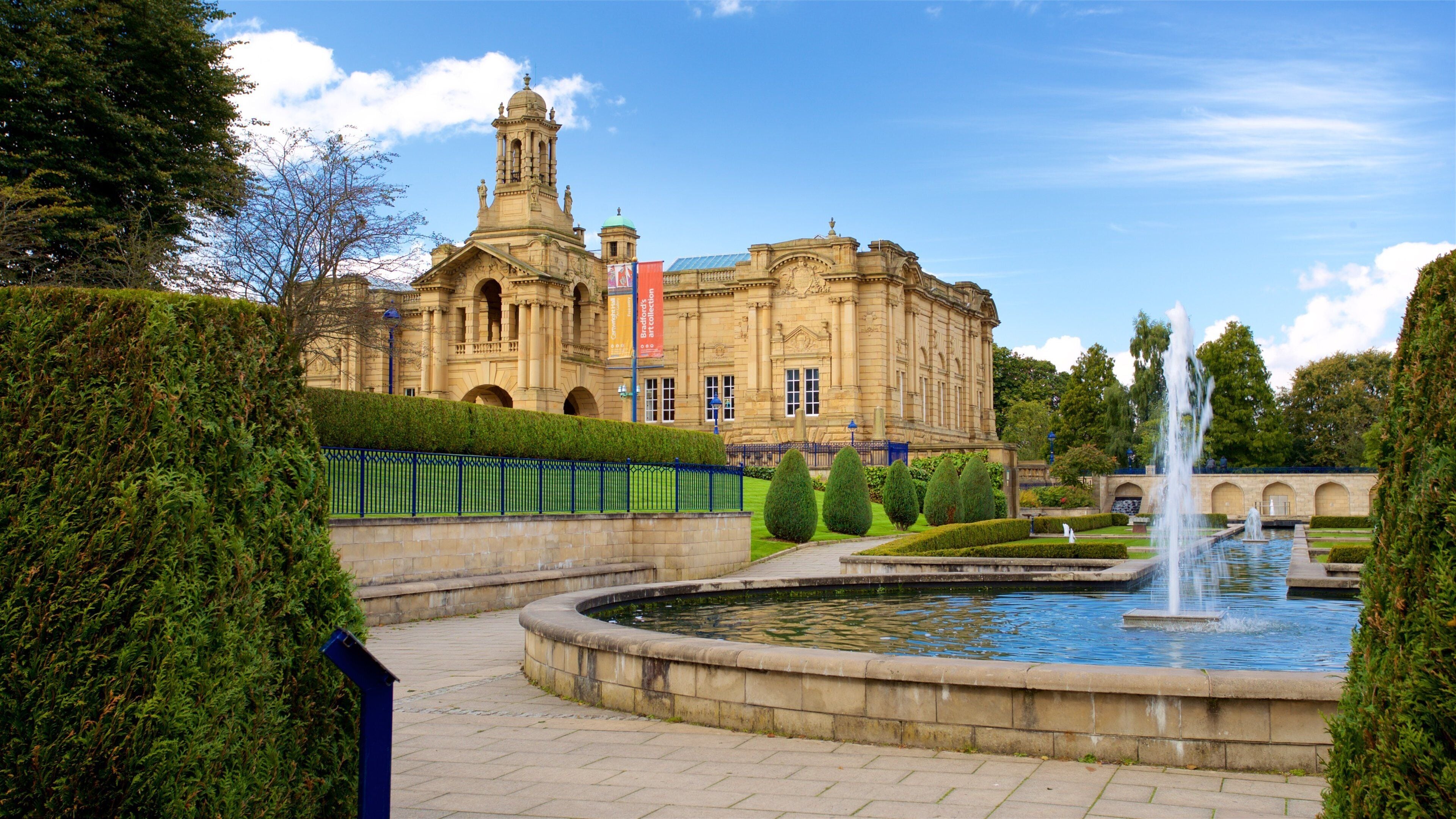 Lister Park showing heritage architecture, a fountain and a park