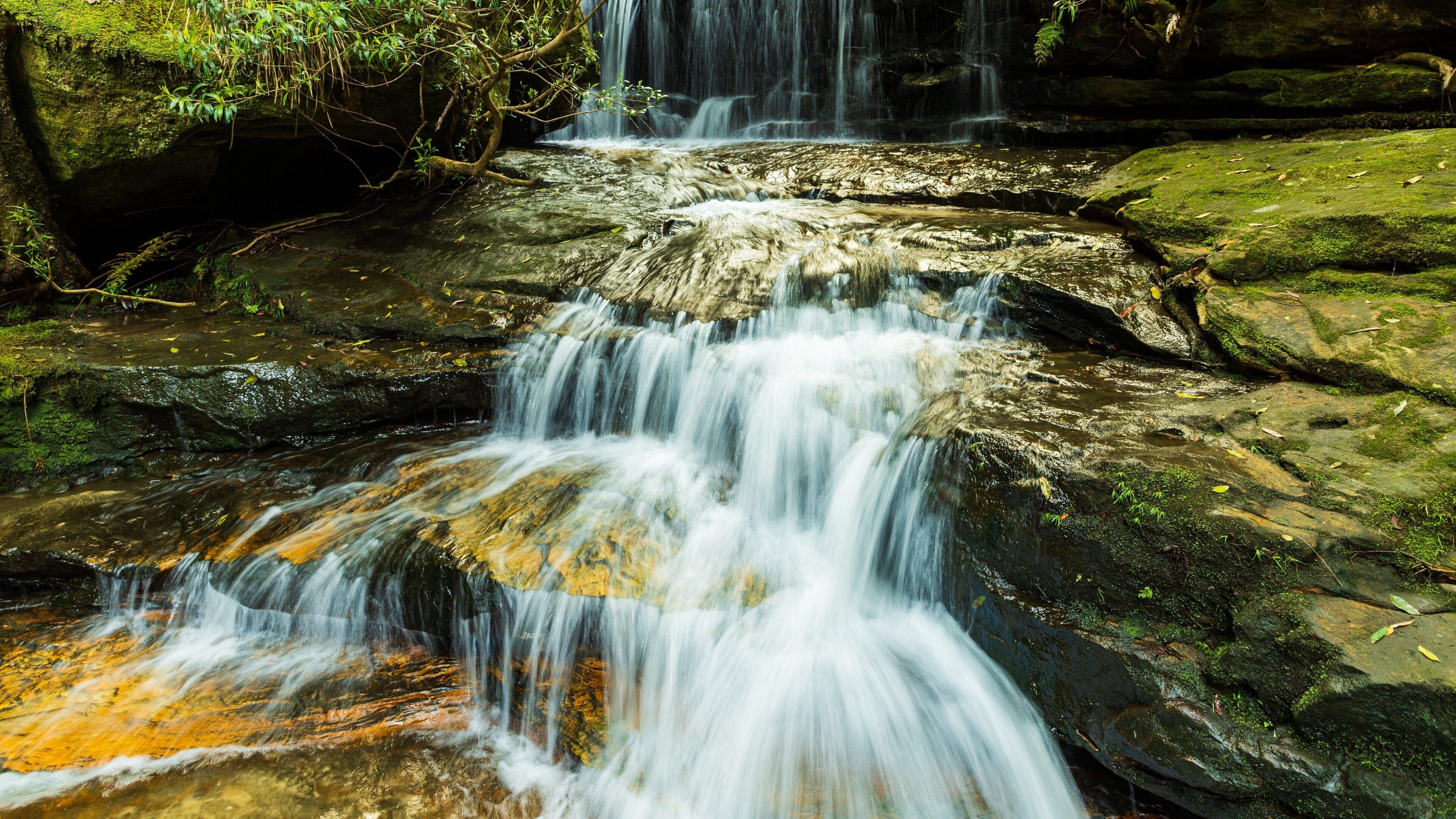 Terrace Falls Reserve which includes a waterfall and a river or creek