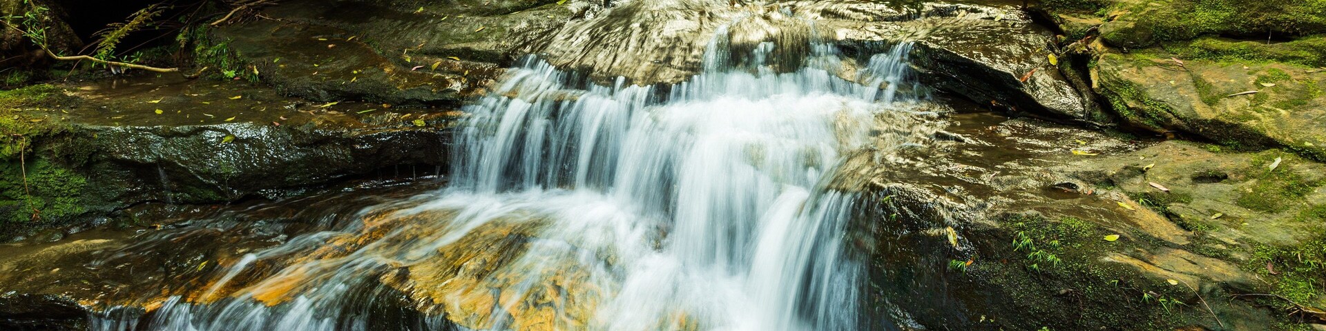 Terrace Falls Reserve which includes a waterfall and a river or creek