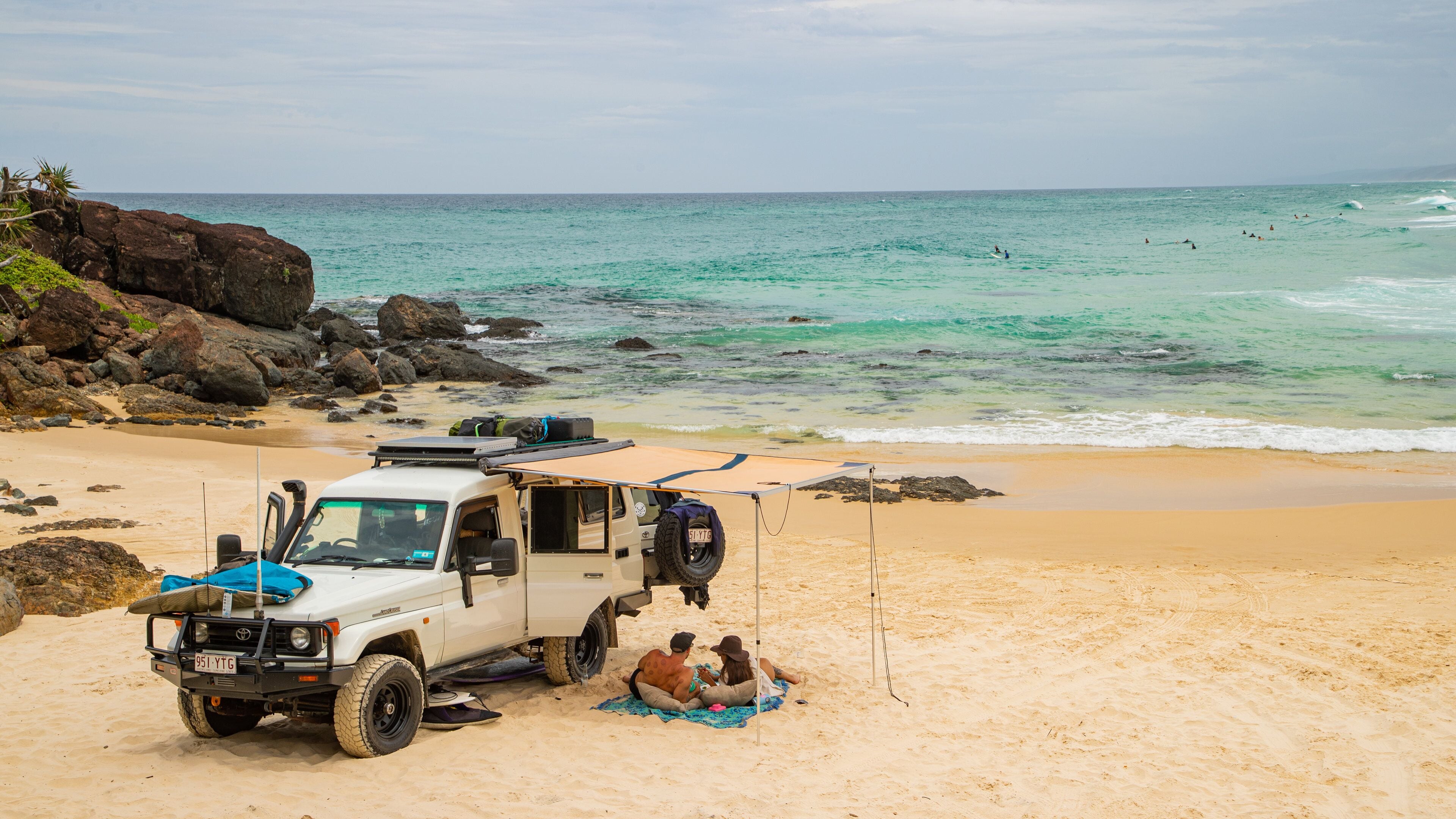 Double Island Point Conservation Park showing general coastal views, off road driving and a sandy beach