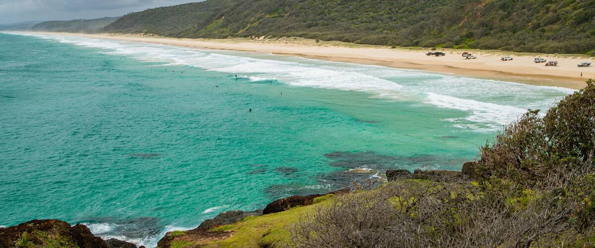 Double Island Point Conservation Park which includes general coastal views and a beach