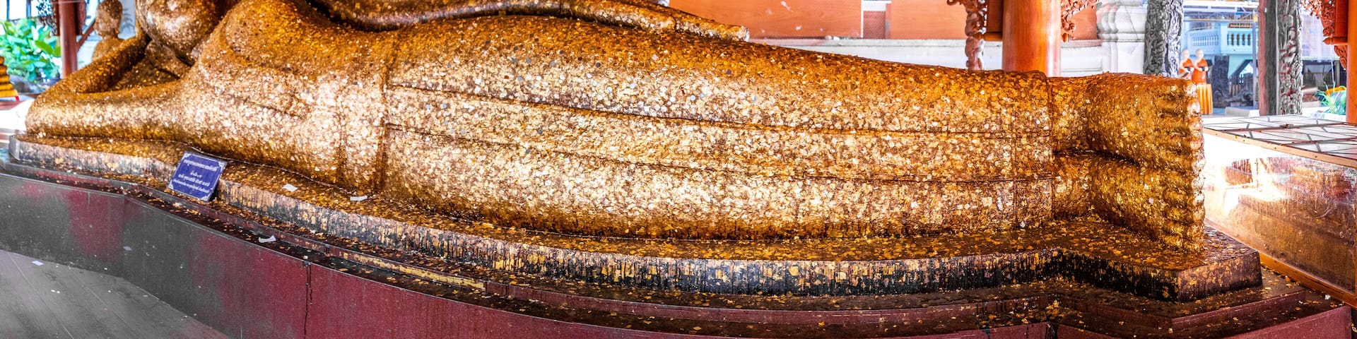 Wat Phra Non Chak Si Worawihan or Wat Phra Non Chakkrasi Worawihan, big reclined Buddha, in Sing buri, Thailand