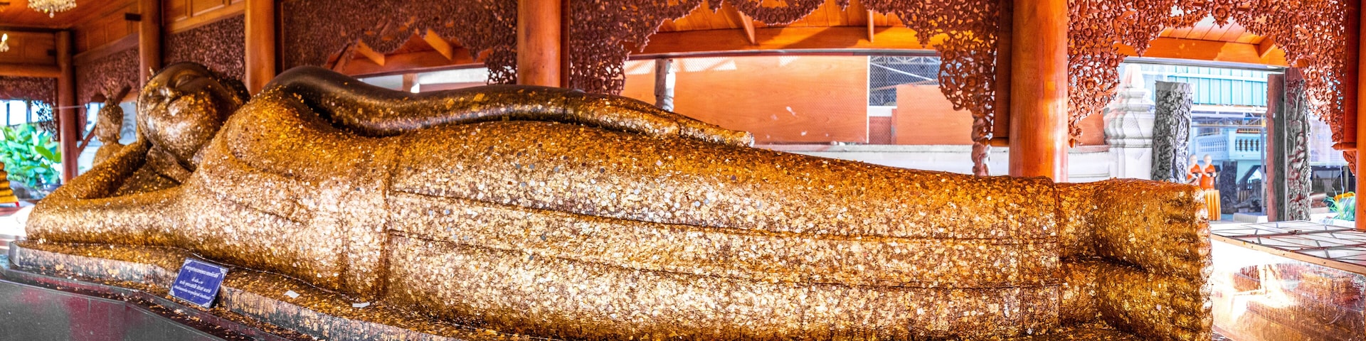 Wat Phra Non Chak Si Worawihan or Wat Phra Non Chakkrasi Worawihan, big reclined Buddha, in Sing buri, Thailand