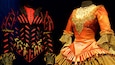 Two elaborate costumes with intricate designs and embellishments.