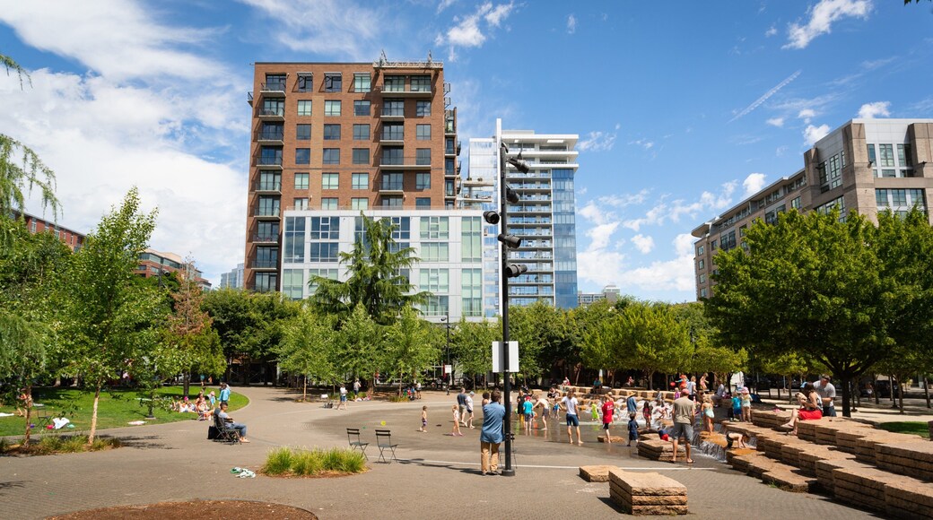 Jamison Square which includes a park as well as a small group of people