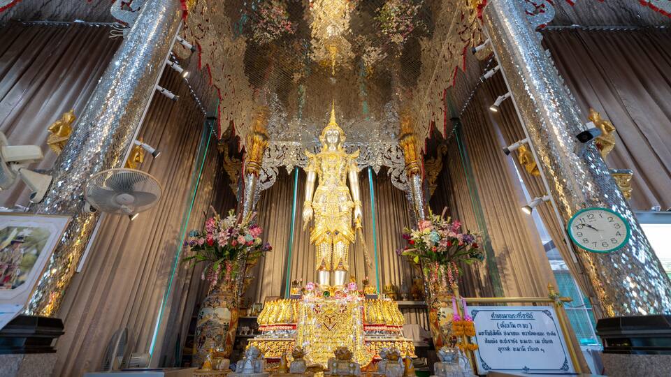 Uthai Thani District, Uthai Thani / Thailand / March 01, 2020 : Wat Tha Sung (Chantaram). Buddhist temple complex featuring an interior adorned with shiny, mirrored tiles & columns..