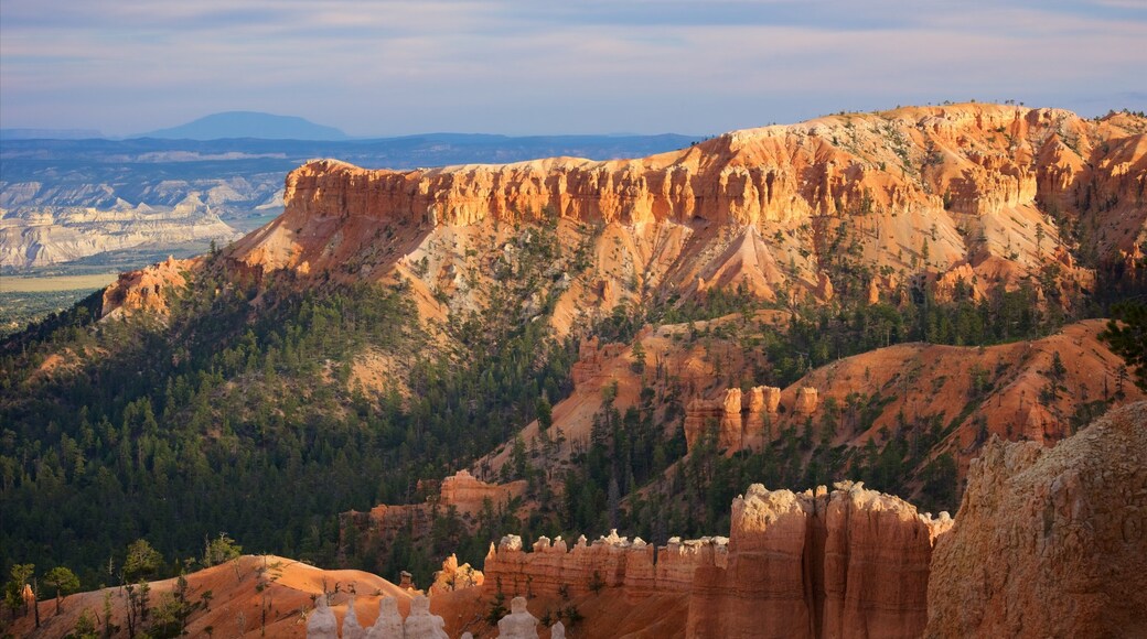 Sunset Point which includes a sunset, a gorge or canyon and desert views