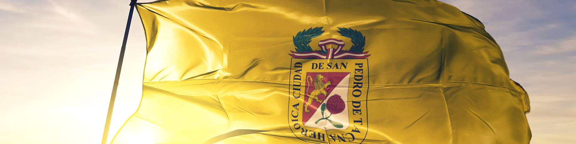 Tacna of Peru flag waving on the top sunrise mist fog