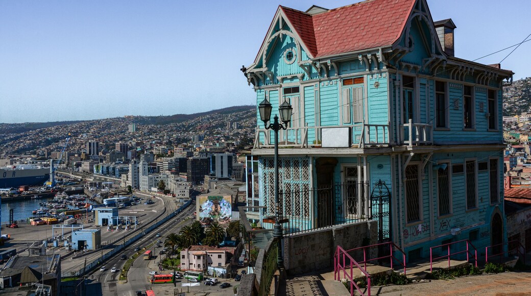 Beautiful landscape of Valparaiso city from Paseo 21 de Mayo viewpoint, Cerro Artilleria. Next to funicular railway with aerial view of part of Valparaiso Harbor, Chile