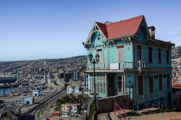 Beautiful landscape of Valparaiso city from Paseo 21 de Mayo viewpoint, Cerro Artilleria. Next to funicular railway with aerial view of part of Valparaiso Harbor, Chile