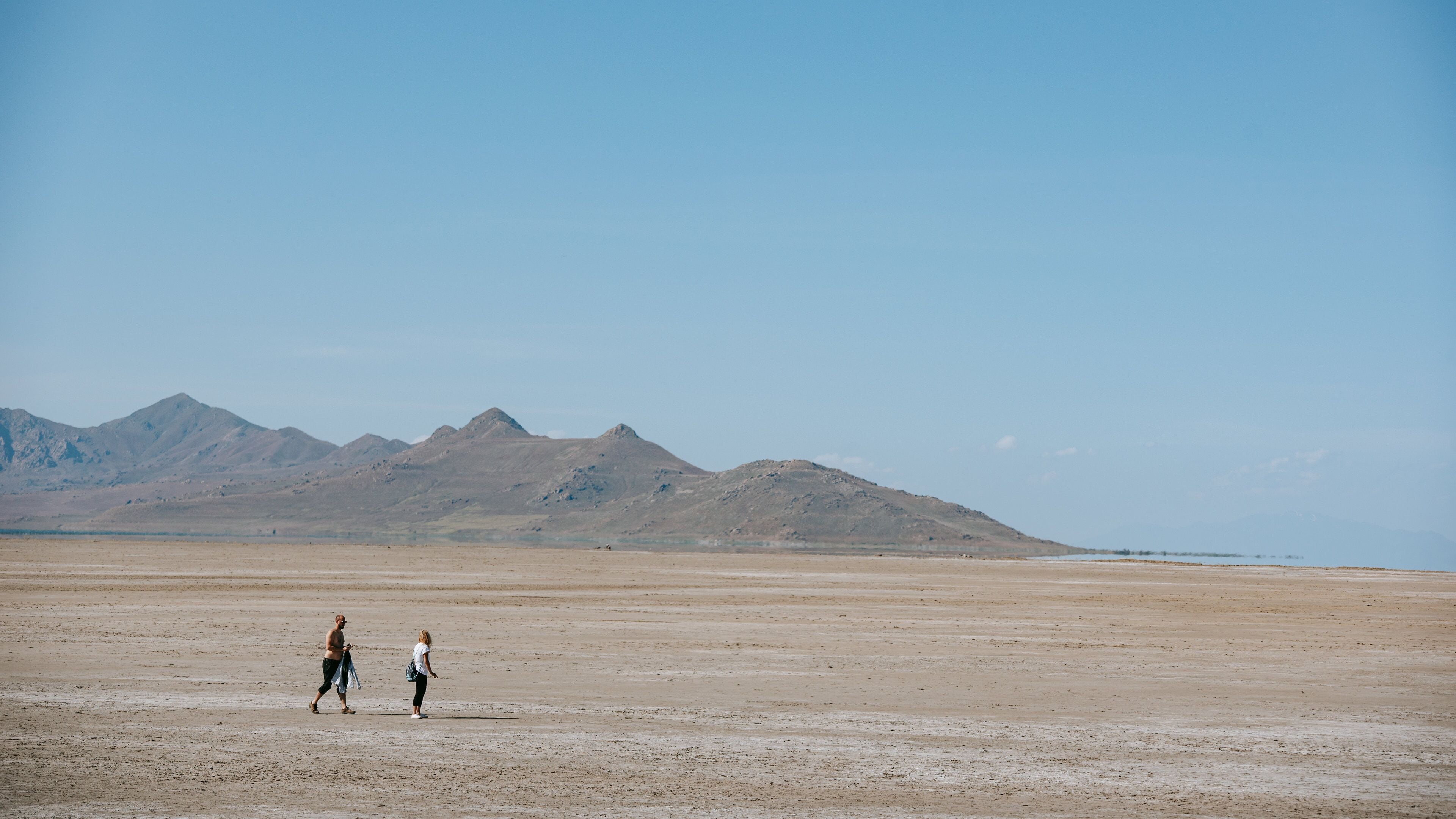 Great Salt Lake State Park featuring desert views as well as a couple