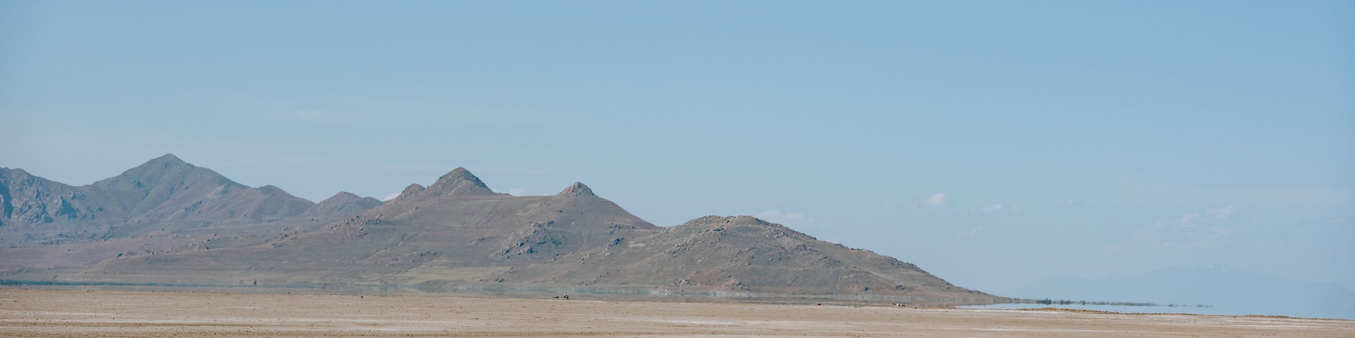 Great Salt Lake State Park featuring desert views as well as a couple