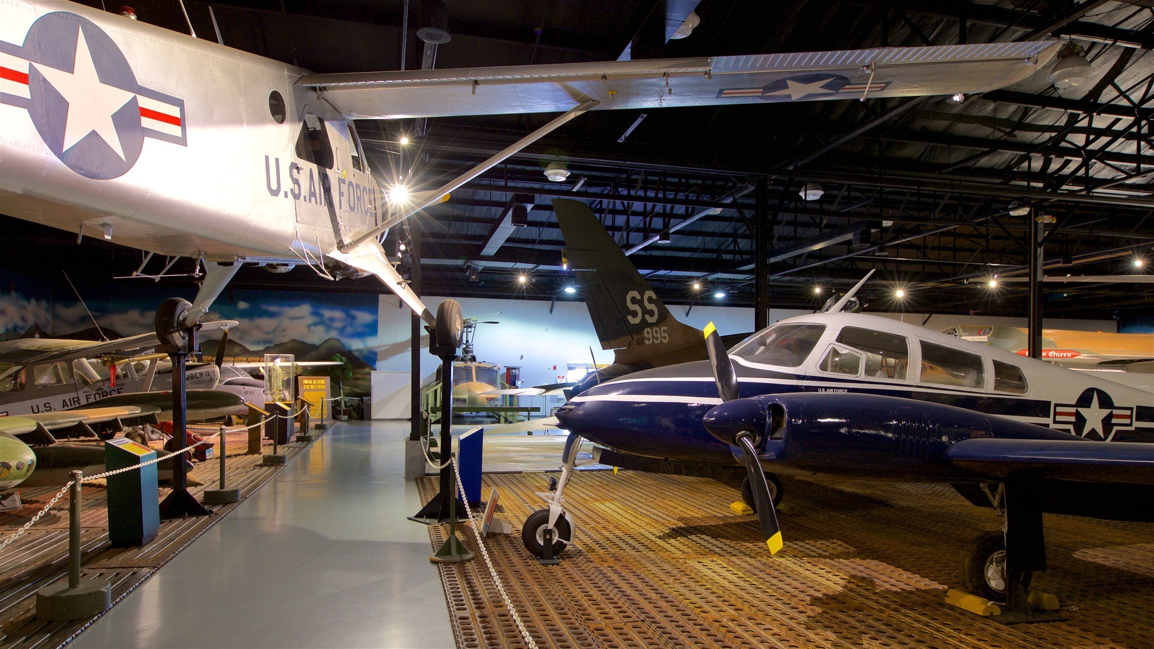 Warner Robins Museum of Aviation showing interior views, military items and heritage elements