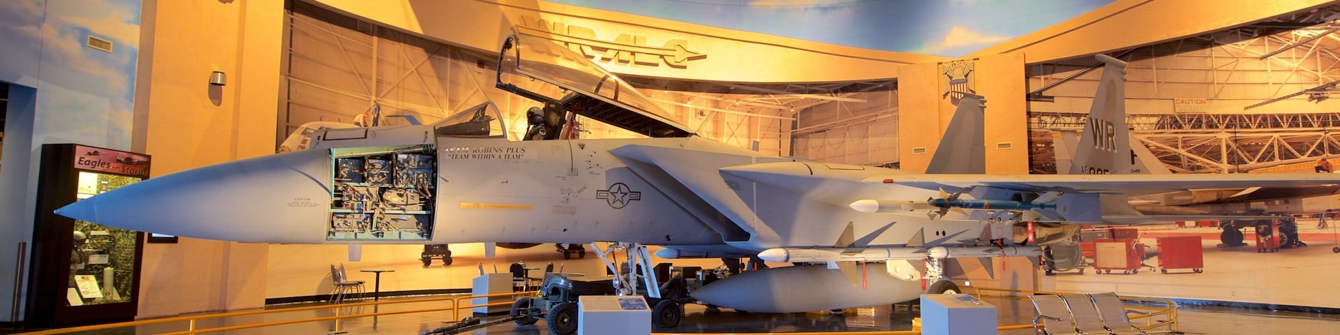 Warner Robins Museum of Aviation which includes heritage elements, military items and interior views