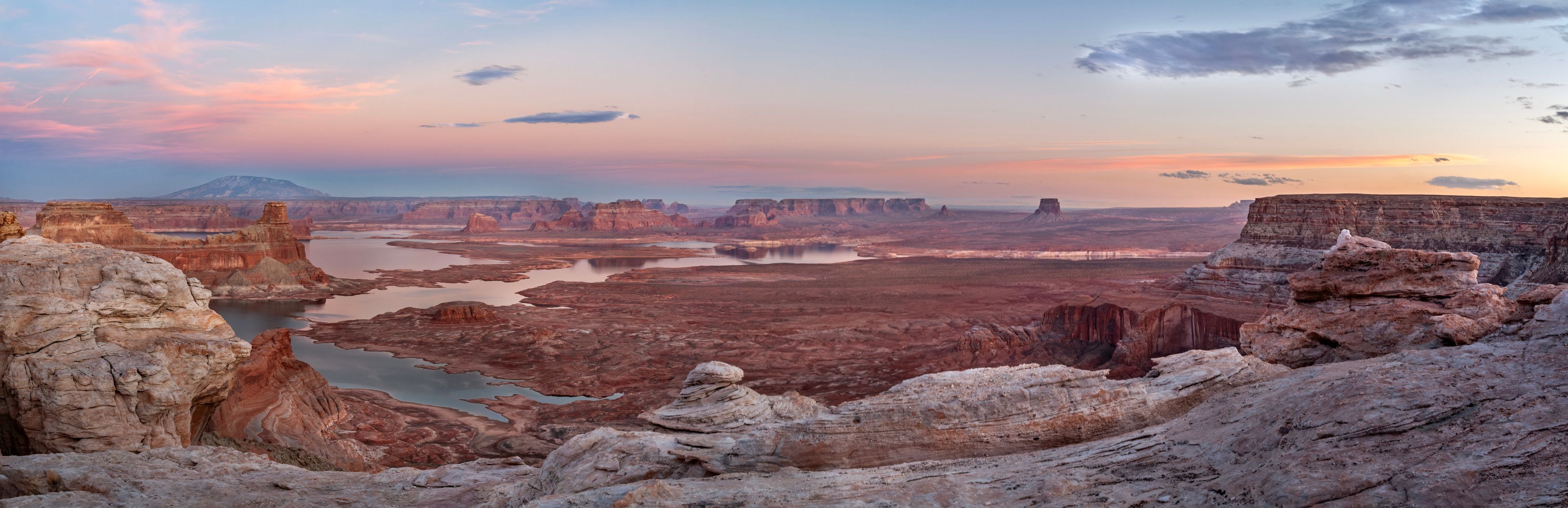 Sunset over Lake Powell and Alstrom Point with Gunsight Butte view, Utah desert landscape, USA.