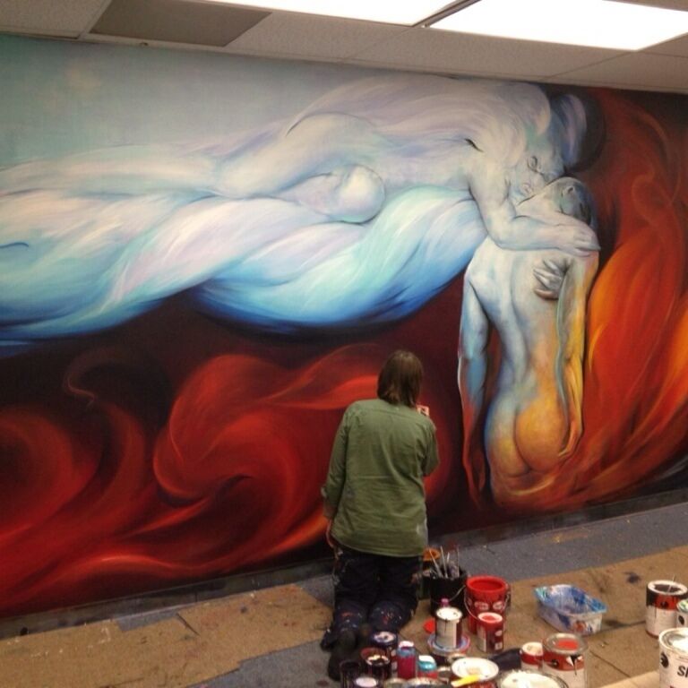 Muralist at work at Artomatic 2012.