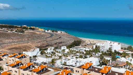 A town with white houses, hotels alond the coast of Atlantic ocean.