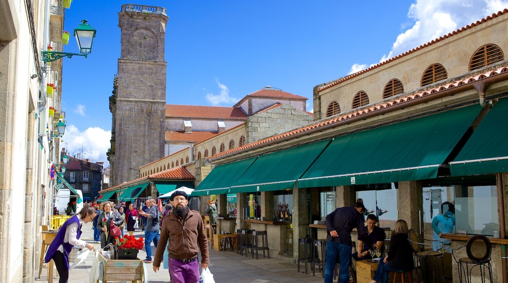 Mercado de Abastos de Santiago featuring markets, street scenes and cafe lifestyle