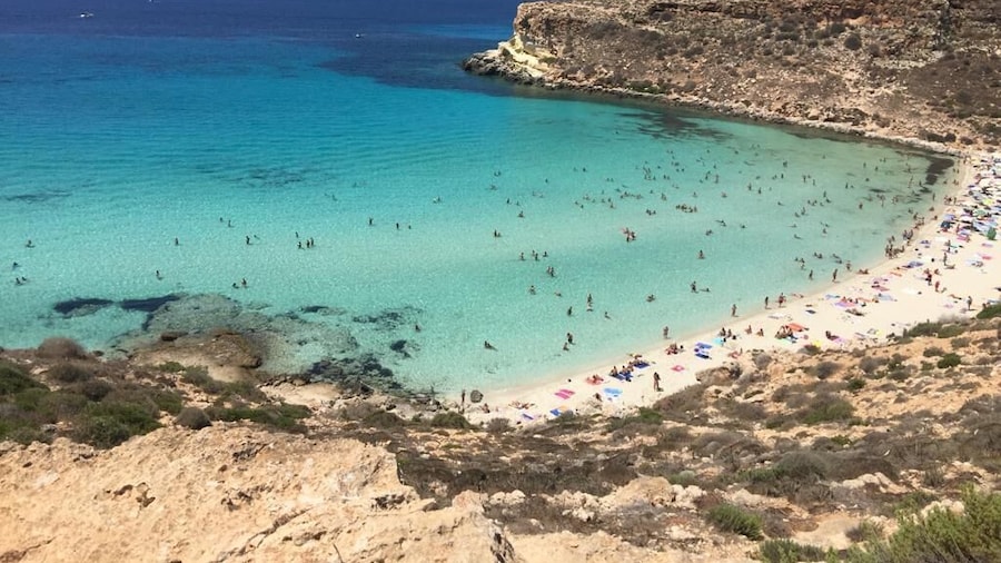 The range of blue color in the sea and its contrast with the colors of the land it's unbelievable when you spot it from the top of the hill. An imotion I will never forget