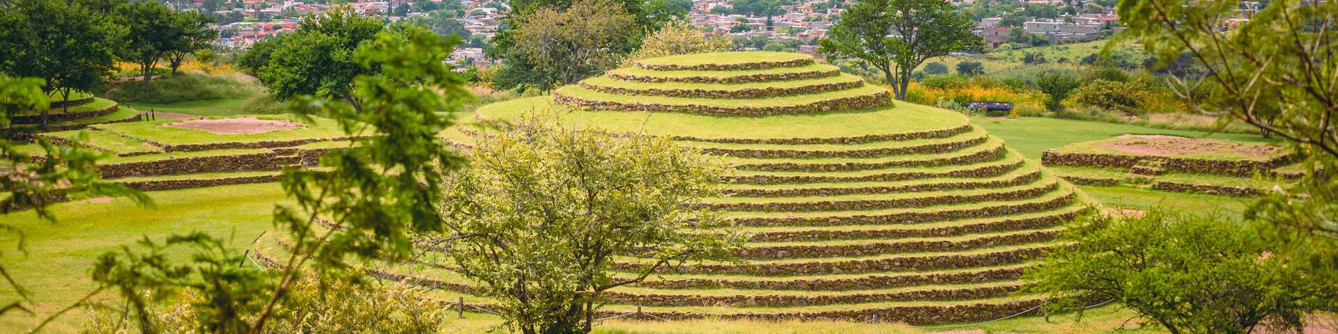 Archeological zone of Guachimontones in the state of Jalisco, Mexico. Pyramid with summer landscape and blue sky