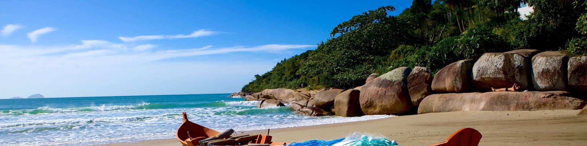 Strand von Barra da Lagoa das einen Strand, Bootfahren und Landschaften