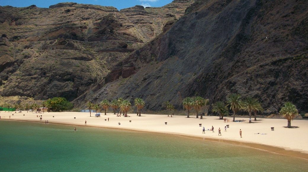 A beautiful beach on the island of Tenerife. The sand is imported from Morocco. Natural sand of Tenerife is black and so this was a delight to see yellow sand here.