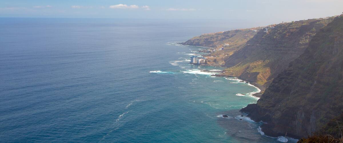 Sauzal which includes mountains, general coastal views and rocky coastline