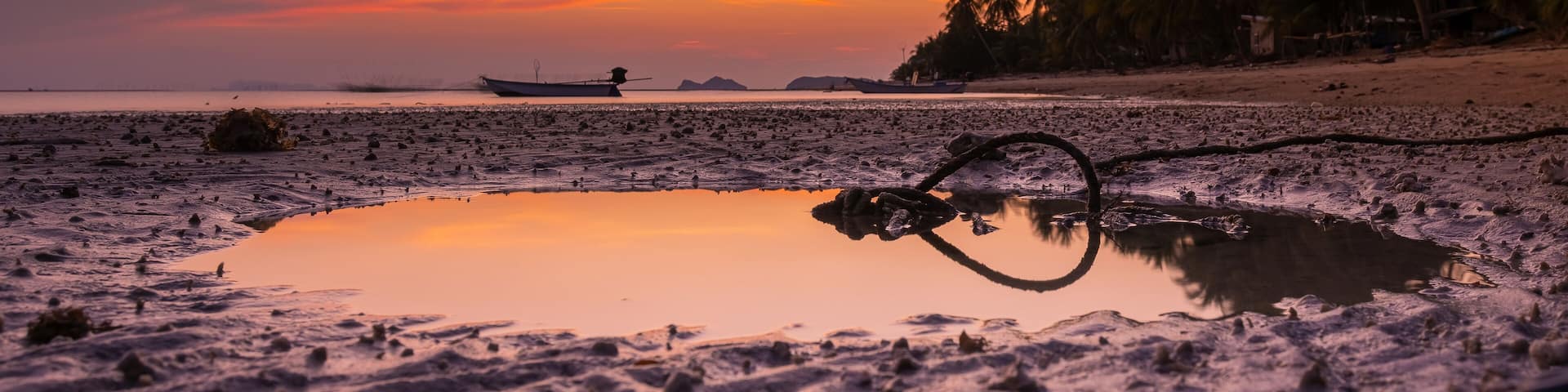 Colorful twilight in evening over seascape at Baan khai beach, Koh Phangan, Thailand. Long exposure photography.