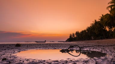 Colorful twilight in evening over seascape at Baan khai beach, Koh Phangan, Thailand. Long exposure photography.