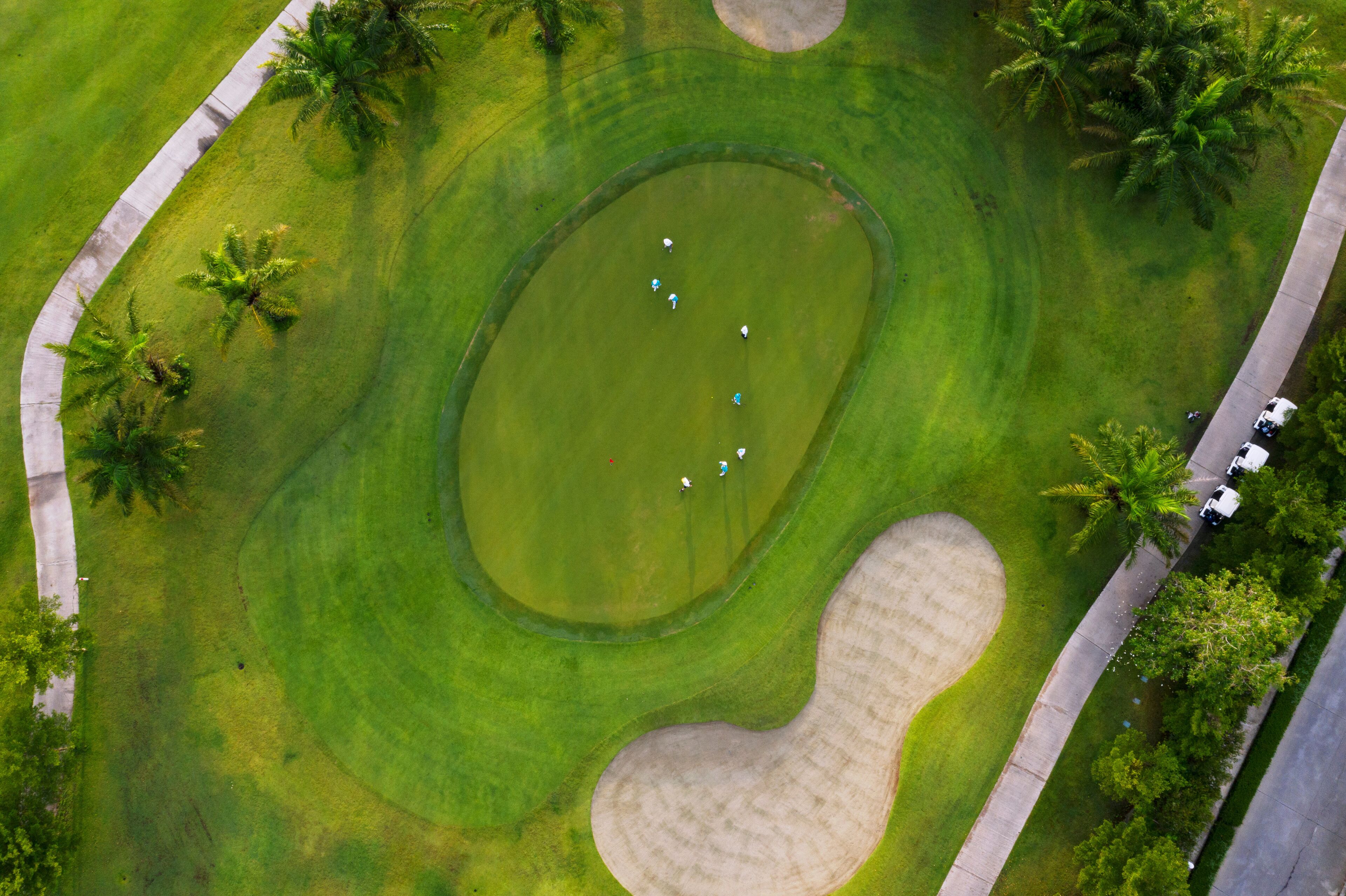 Aerial view of the green golf course in Thailand.
