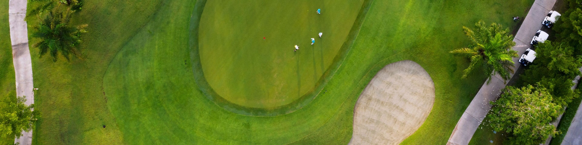 Aerial view of the green golf course in Thailand.
