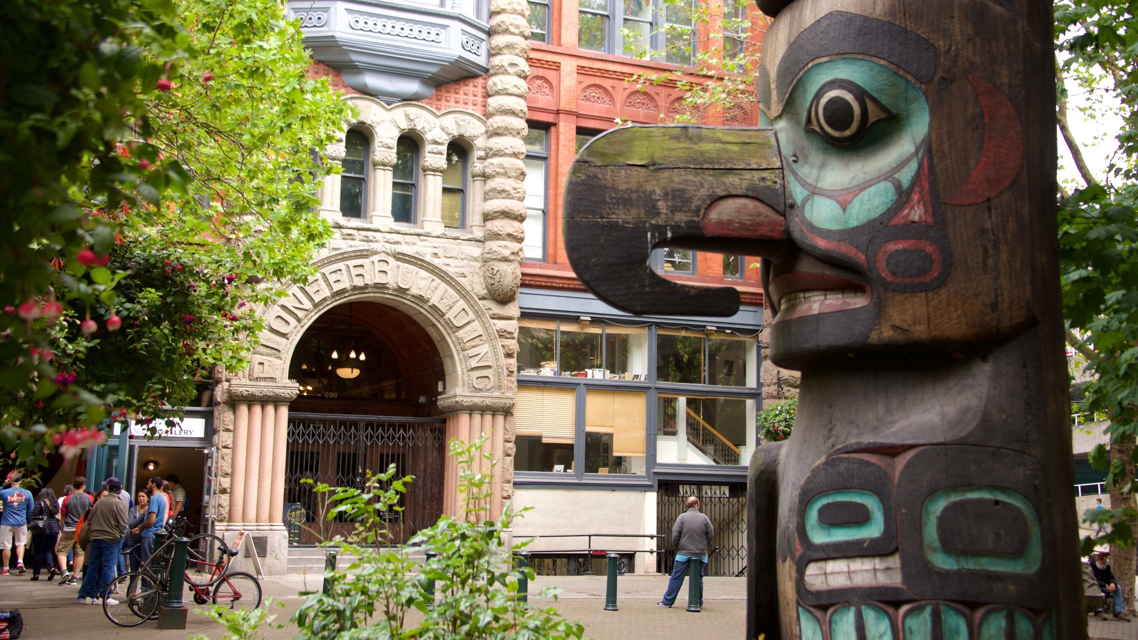 Pioneer Square which includes outdoor art and street scenes