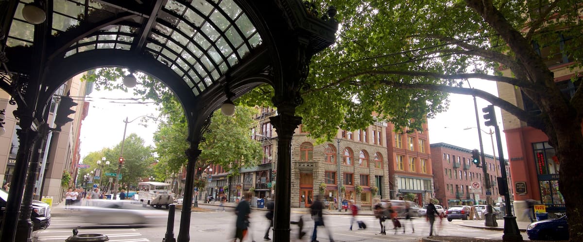 Quartier de Pioneer Square mettant en vedette scènes de rue, quartier d\'affaires et patrimoine architectural