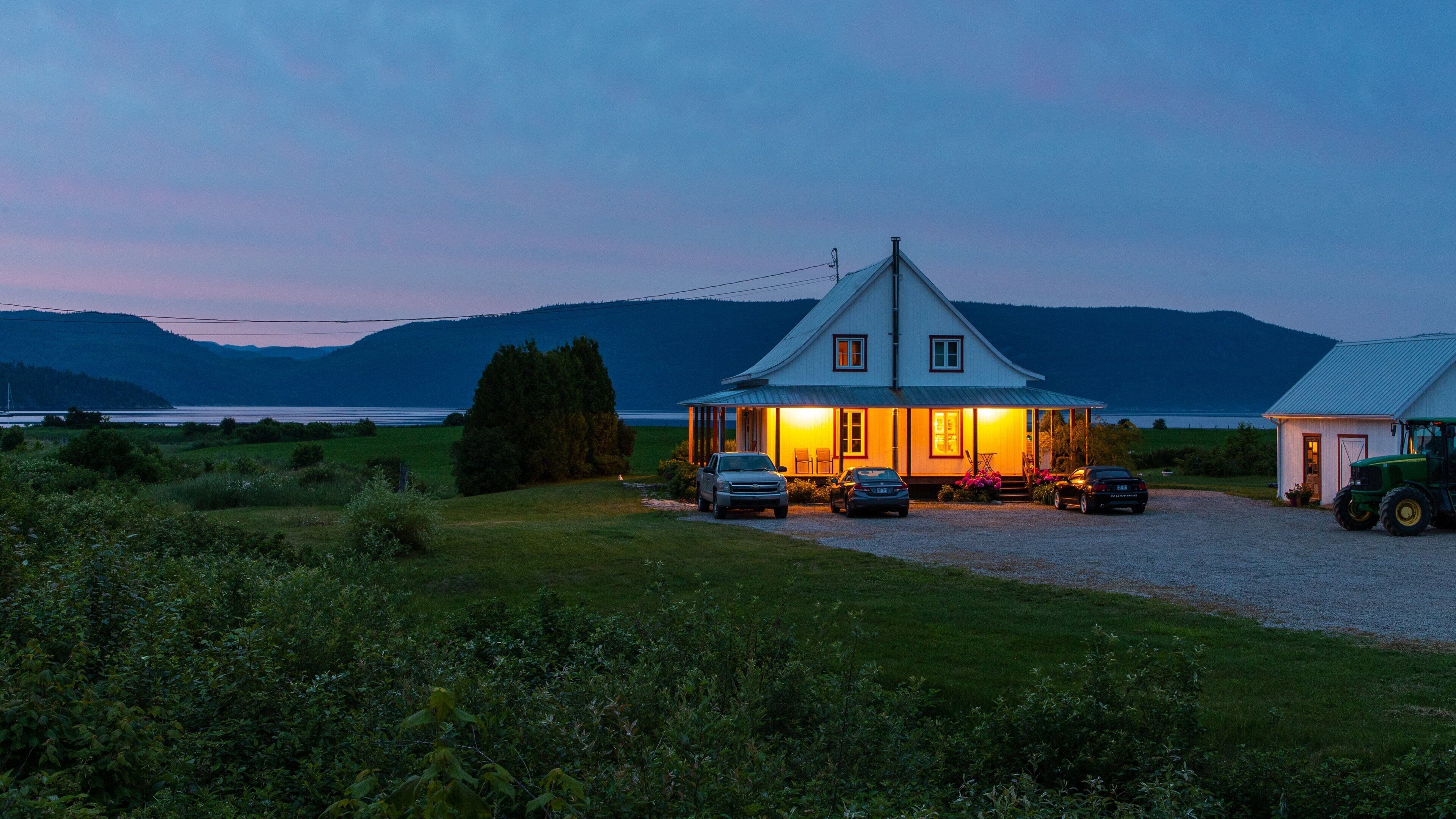 L\'Anse-Saint-Jean which includes a small town or village and night scenes