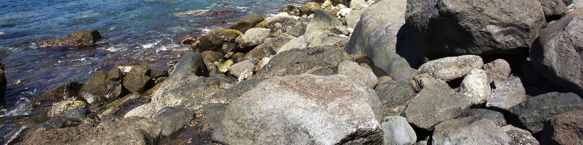 the stone arch Roque de Bonanza at El hierro coast, washed out by the sea