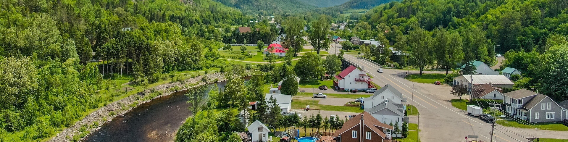 Petit-Saguenay featuring a small town or village, landscape views and a river or creek