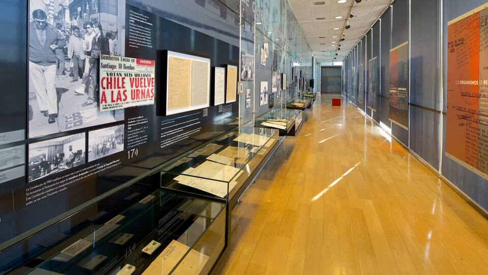 A museum exhibit with historical documents and photographs.