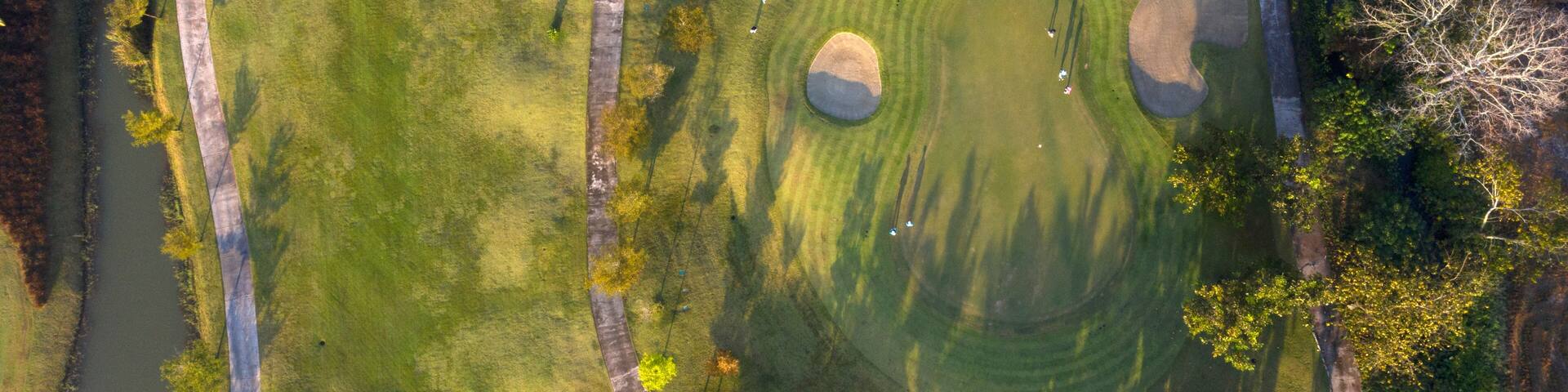 Aerial view of the green golf course in Thailand.