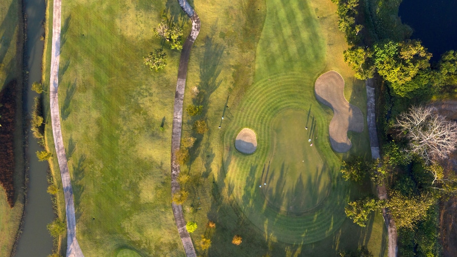 Aerial view of the green golf course in Thailand.