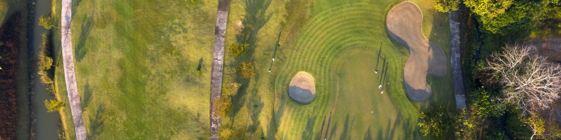 Aerial view of the green golf course in Thailand.