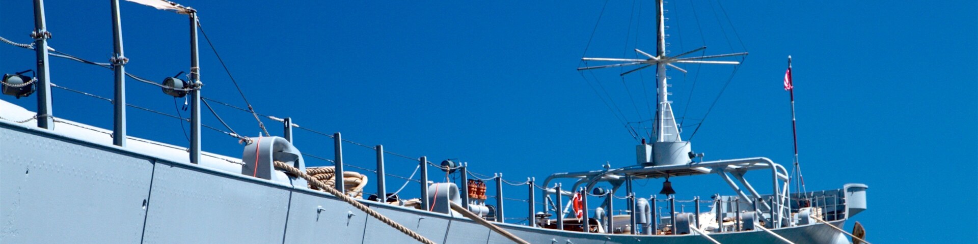 USS Iowa featuring a bay or harbor and military items