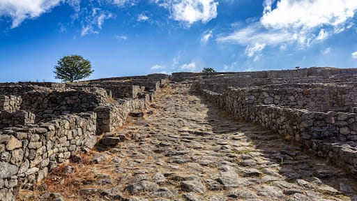 Ancient cobblestone path and granite stone walls of the Iron Age San Cibran de Lás hillfort from the 2nd century BC, San Amaro, Ourense, Spain