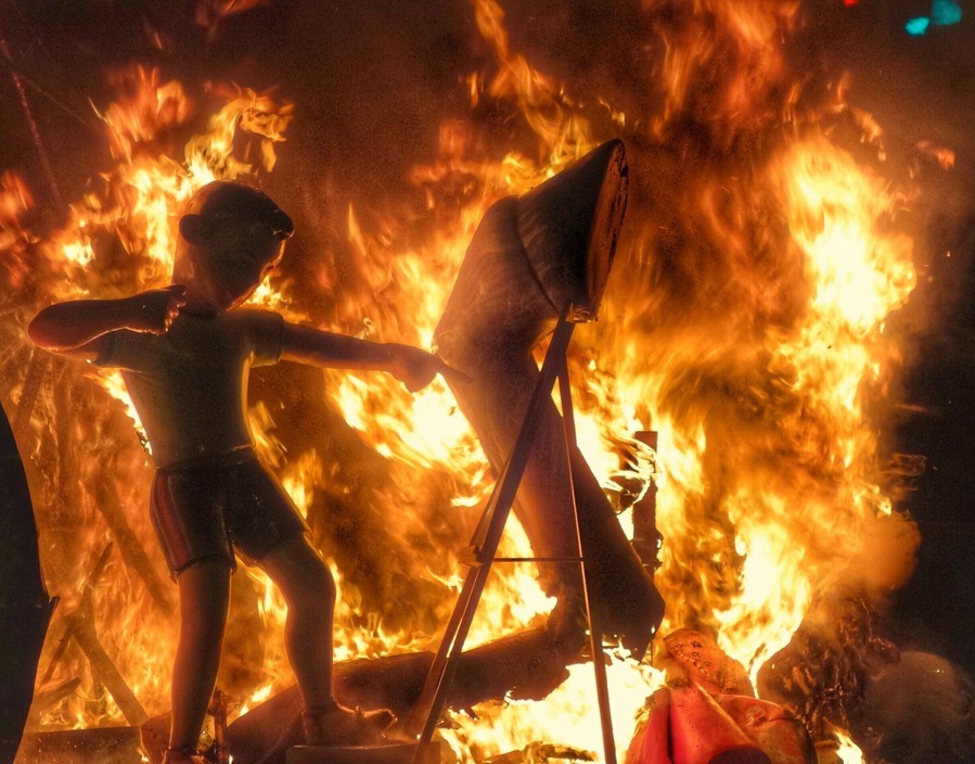 The culmination of the Fallas fiesta is when all the Falla monuments are engulfed by the purifying flames of fire. #red