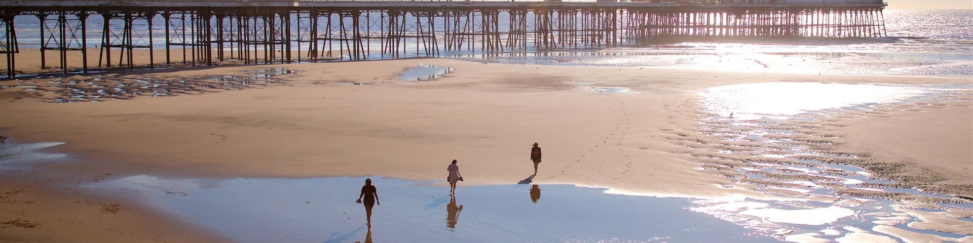 North Pier featuring a sunset, general coastal views and a sandy beach