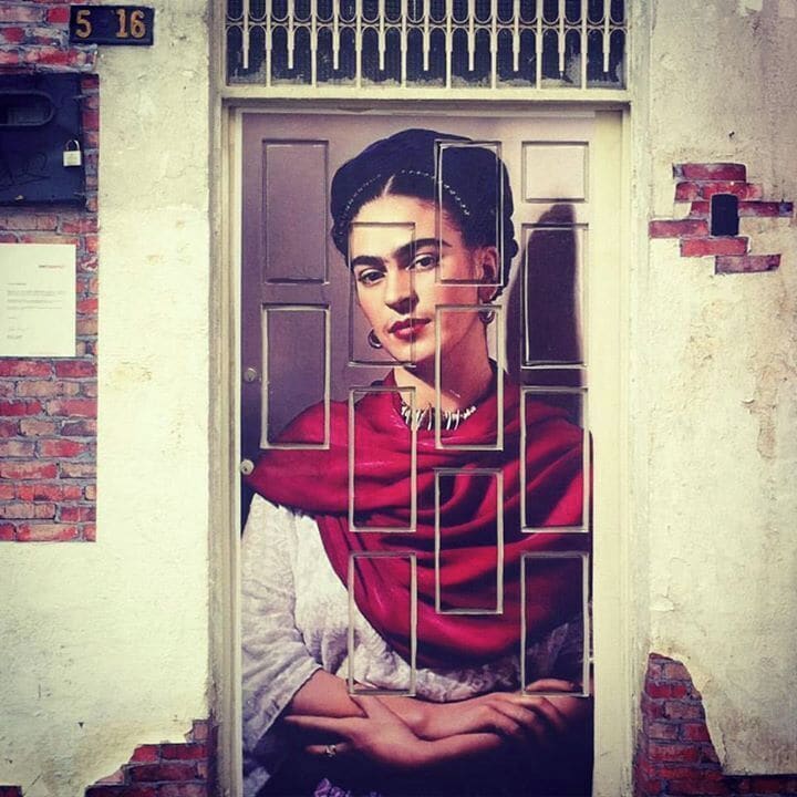The San Antonio area in Cali, Colombia is filled with beautiful houses and street art.

This door had a painting of the quite famous woman Frida Kahlo.

#iphone #streetart