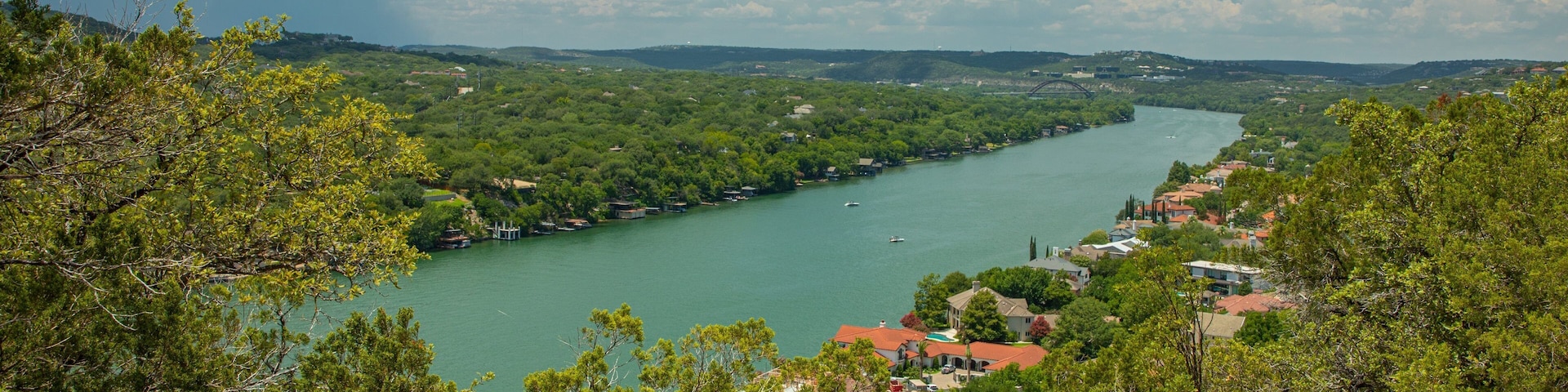 Mount Bonnell which includes a small town or village, landscape views and a river or creek