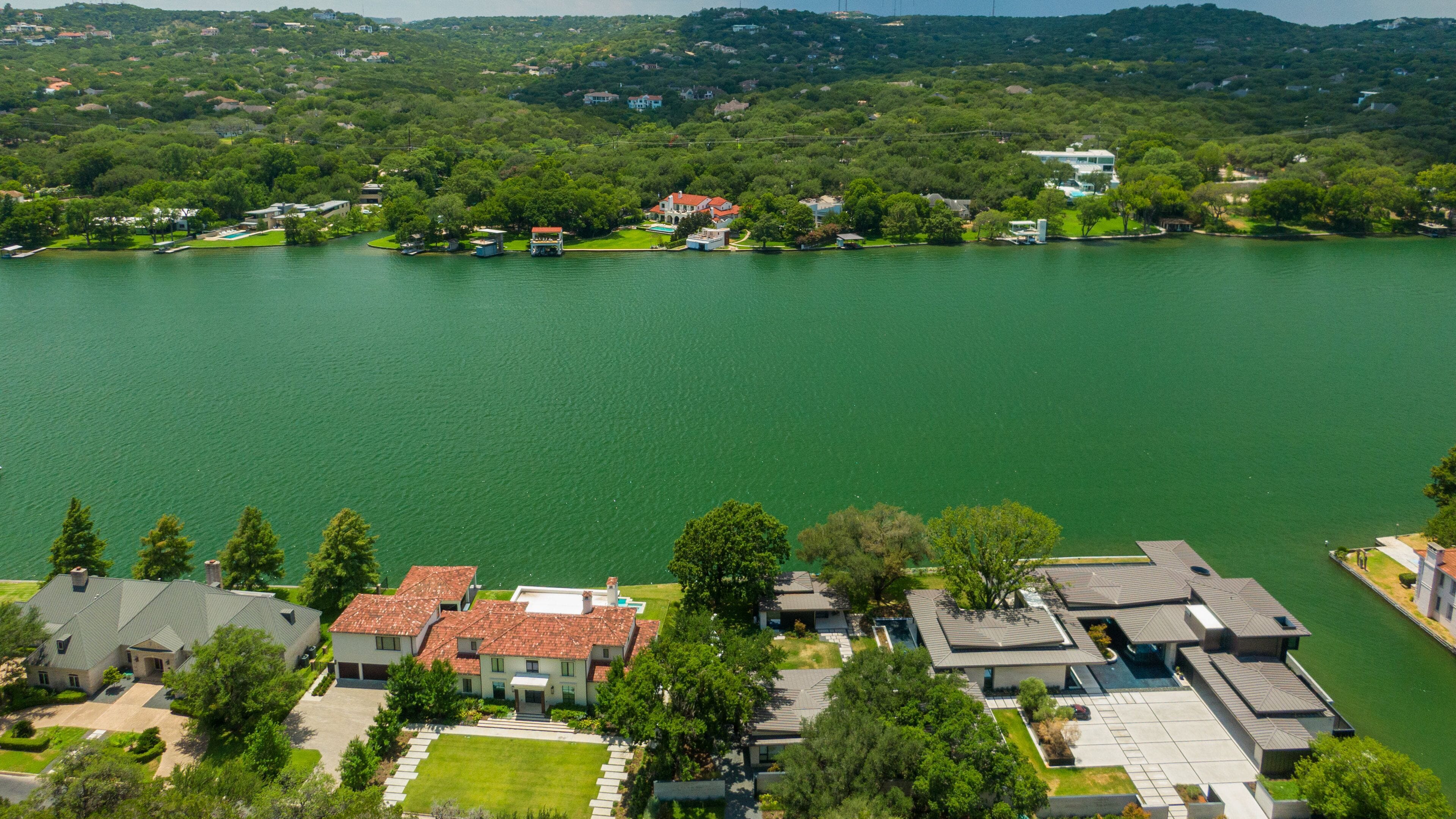 Mount Bonnell which includes a river or creek, landscape views and a small town or village