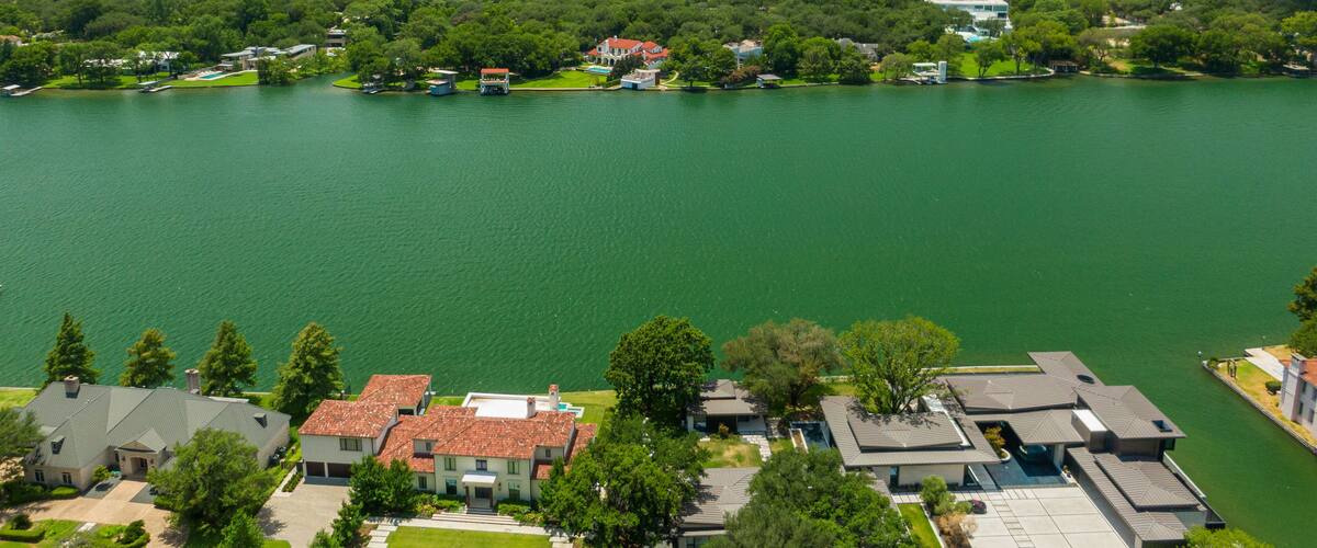 Mount Bonnell which includes a river or creek, landscape views and a small town or village