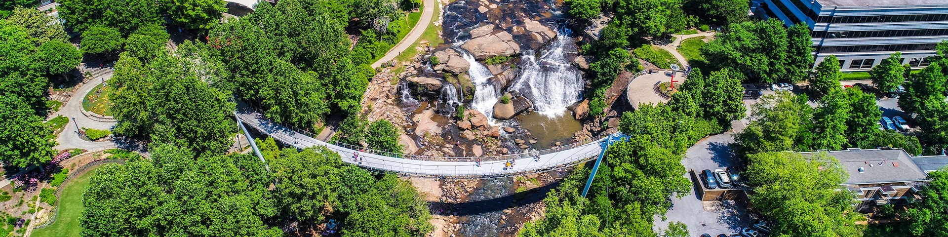 Falls Park and Liberty Bridge Aerial in Downtown Greenville South Carolina SC