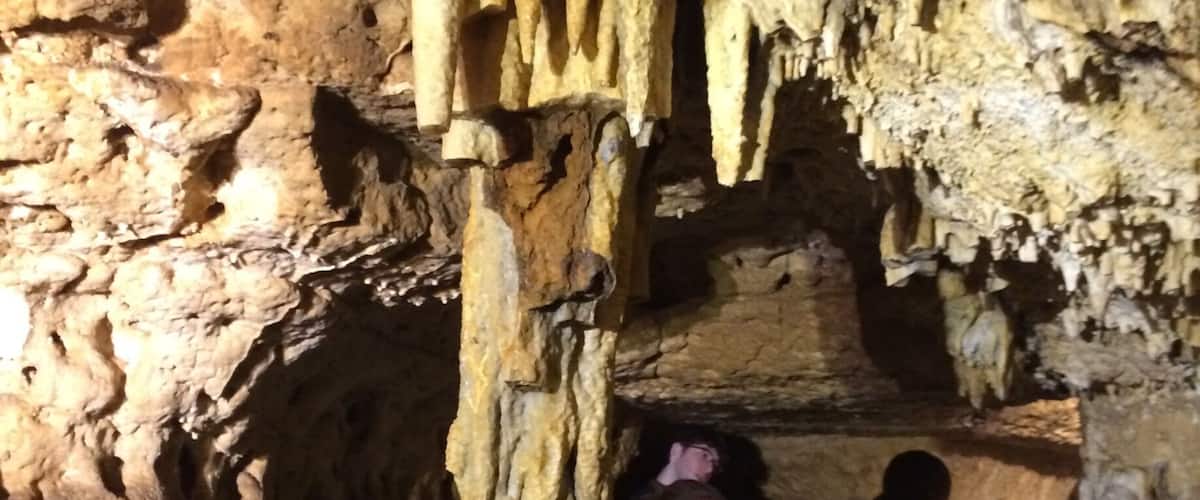 A cave with stalactites and stalagmites.
